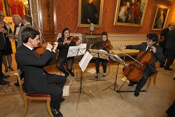 Orchestra with Jean Frene and Mrs Kapsa, France, in background.jpg